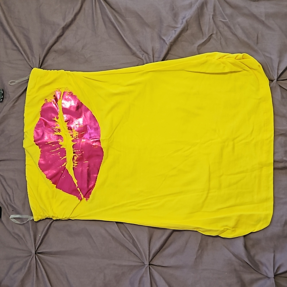Bright yellow and pink lips tube top. Never worn. Size medium. Smoke free home.